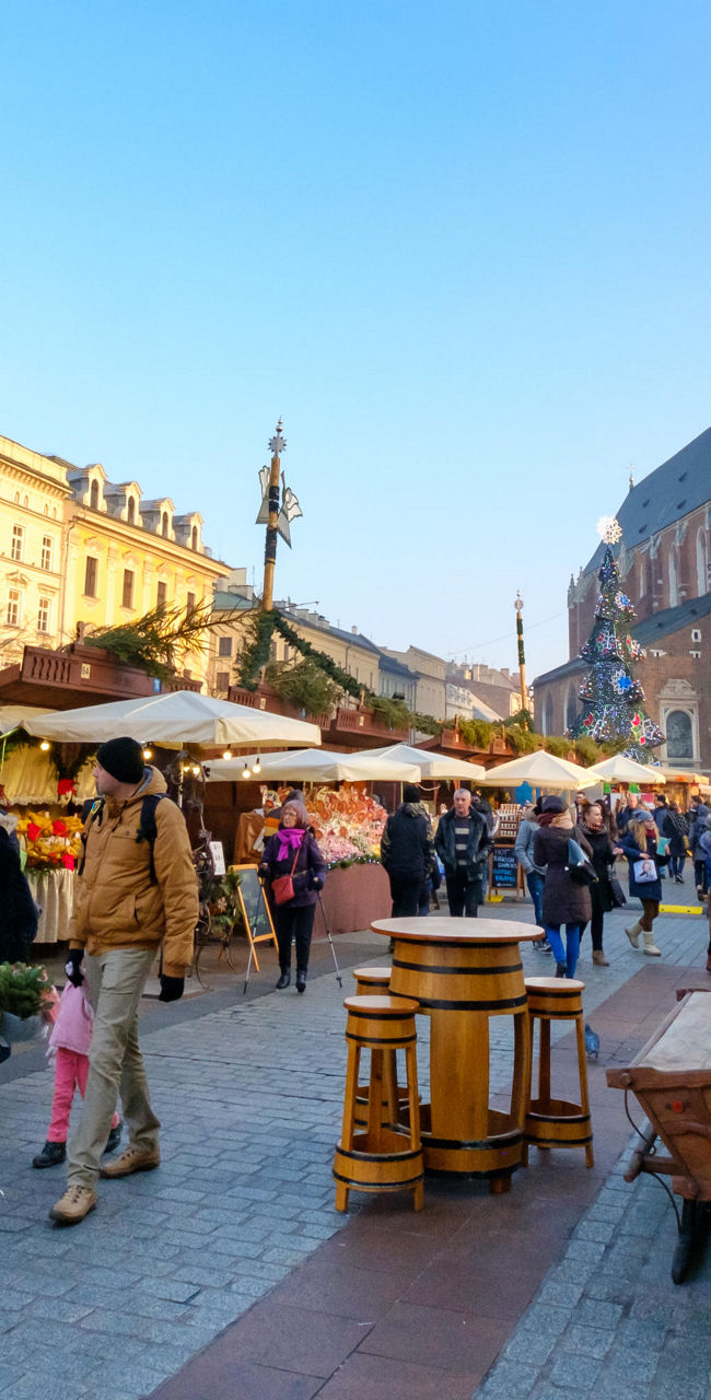 Vibrant Krakow Market Square with St. Mary's Basilica