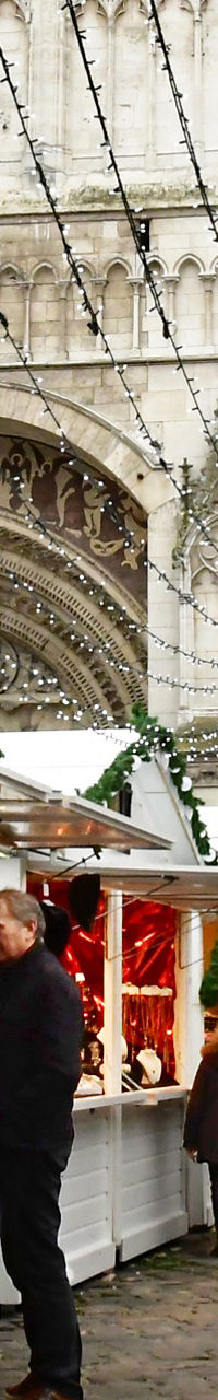 Festive outdoor Christmas market near cathedral