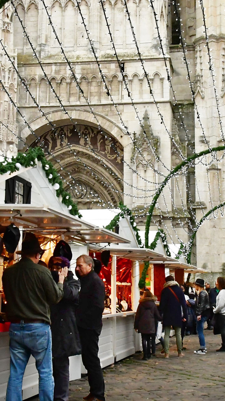 Festive outdoor Christmas market near cathedral