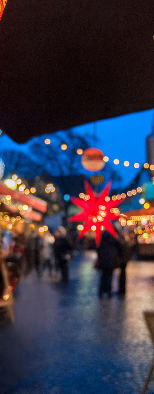Festive star lanterns at outdoor market