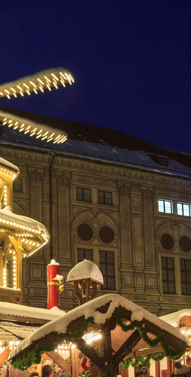 Festive Christmas market with illuminated carousel