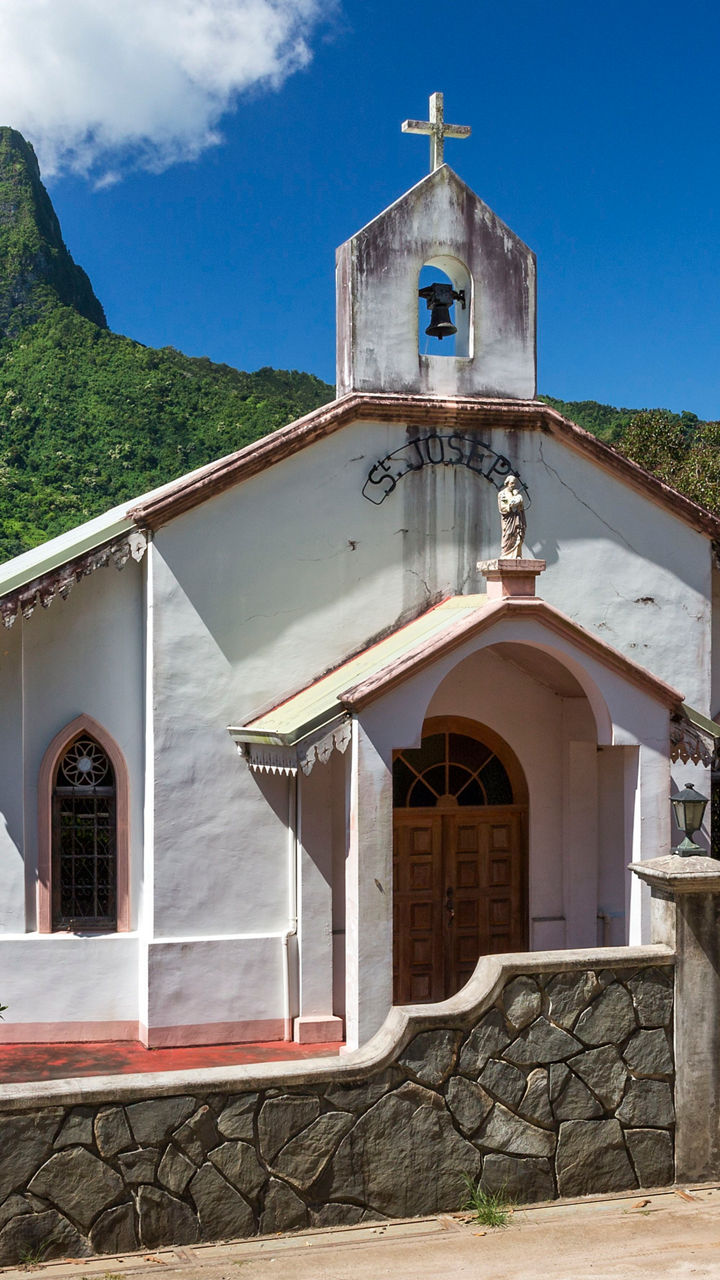 Scenic church with mountain backdrop