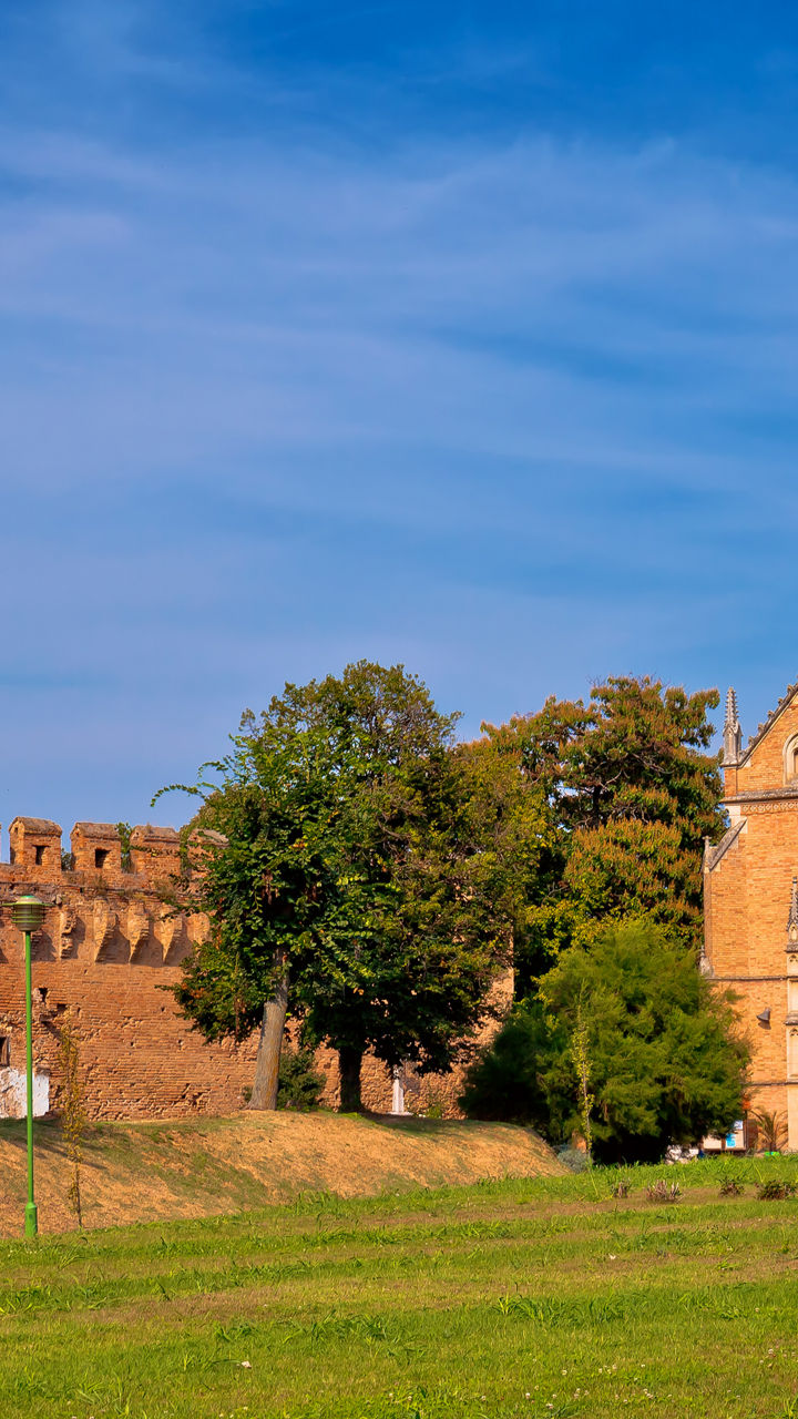 Historic church and medieval brick wall
