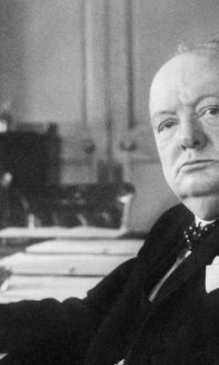 Historical figure in formal office setting