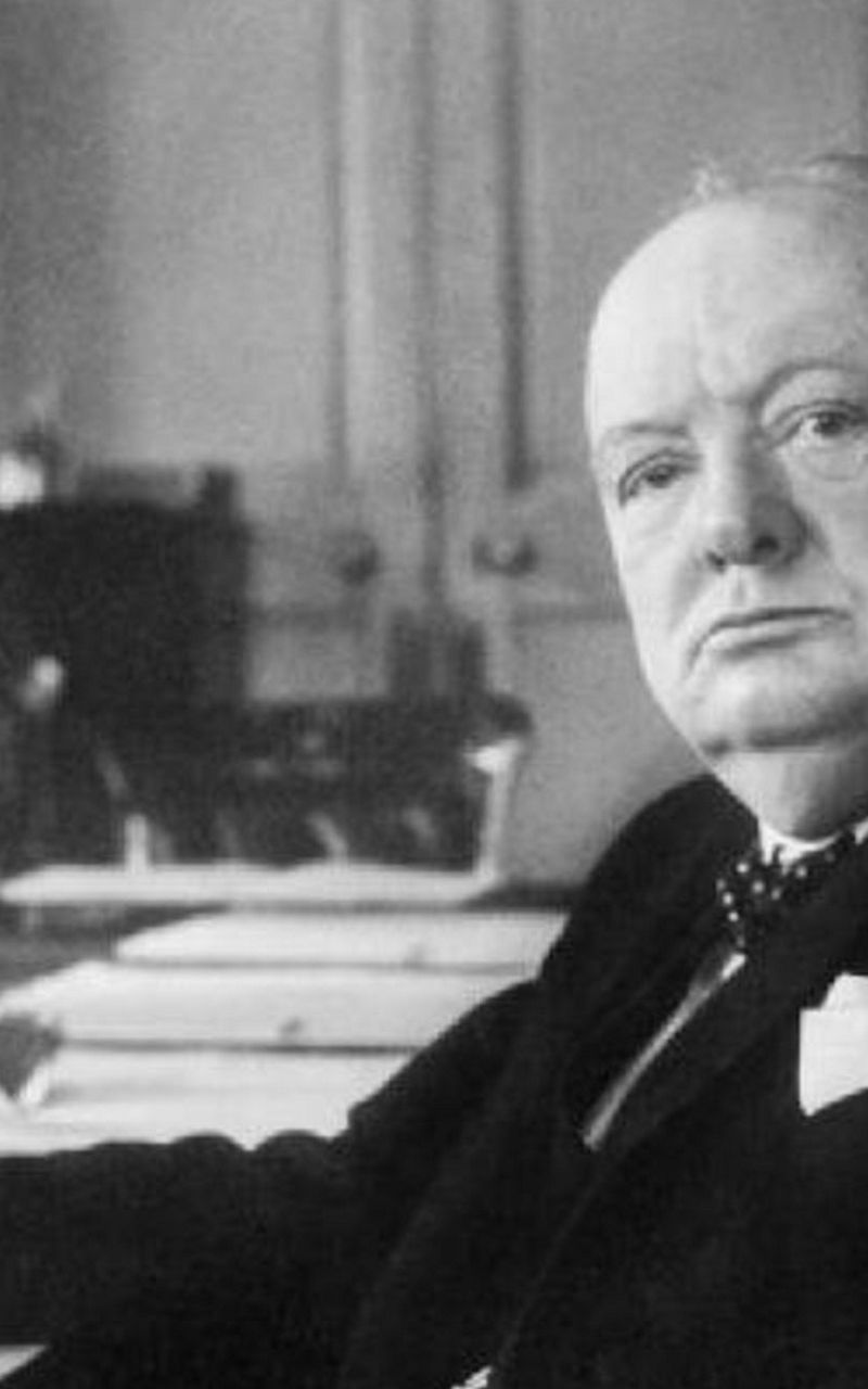 Historical figure in formal office setting