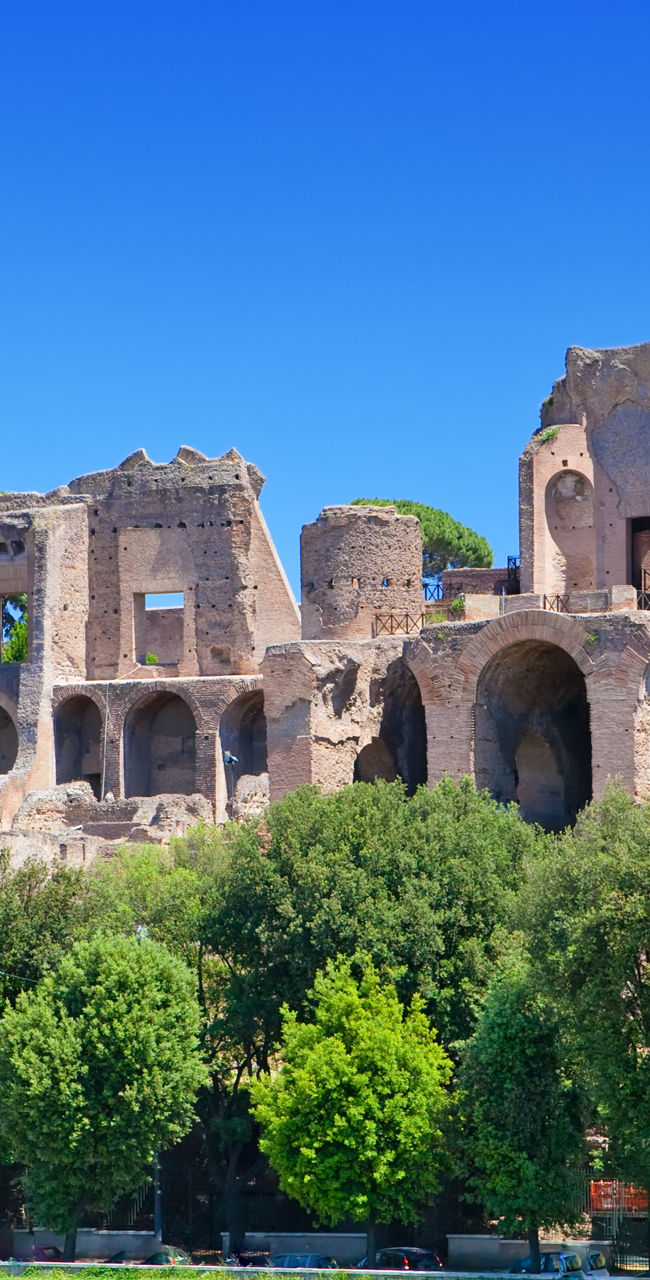 Ancient Roman ruins under clear blue sky