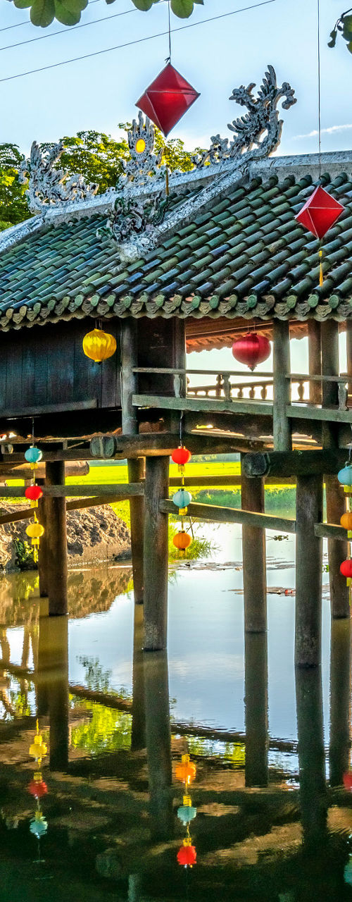 Traditional wooden bridge with lanterns