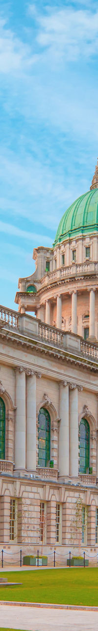 Historic Belfast City Hall under blue sky
