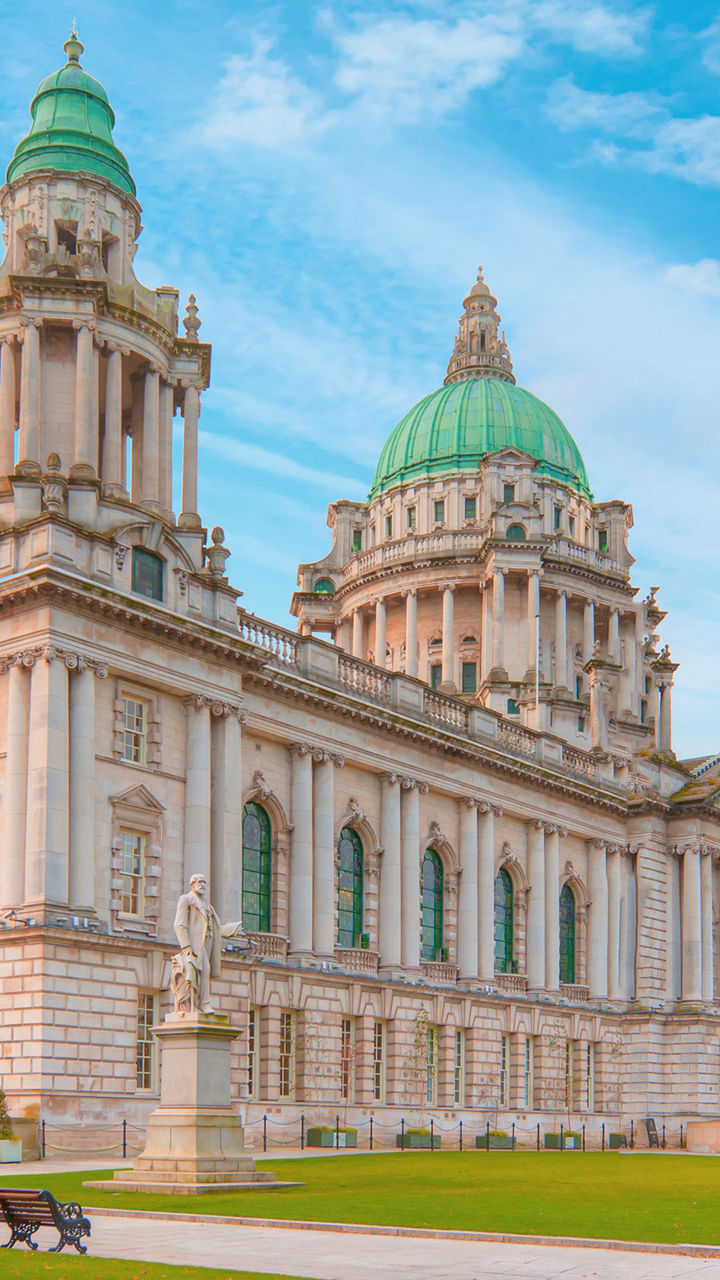 Historic Belfast City Hall under blue sky