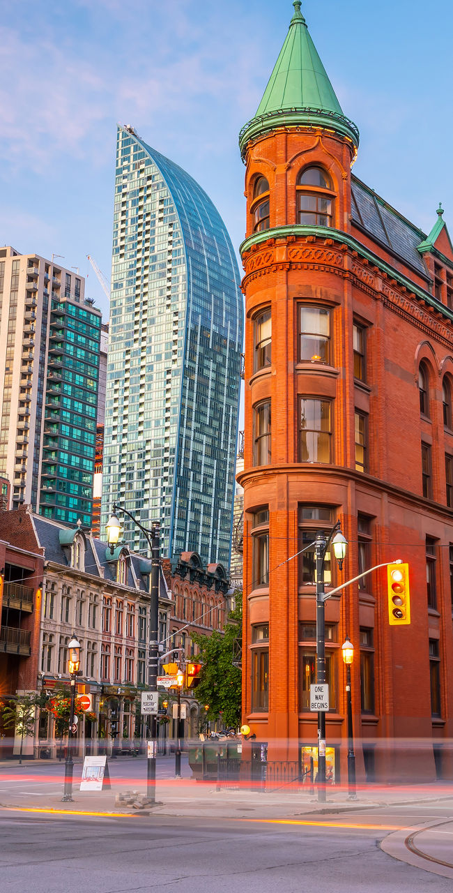 Historic red brick building in Toronto skyline