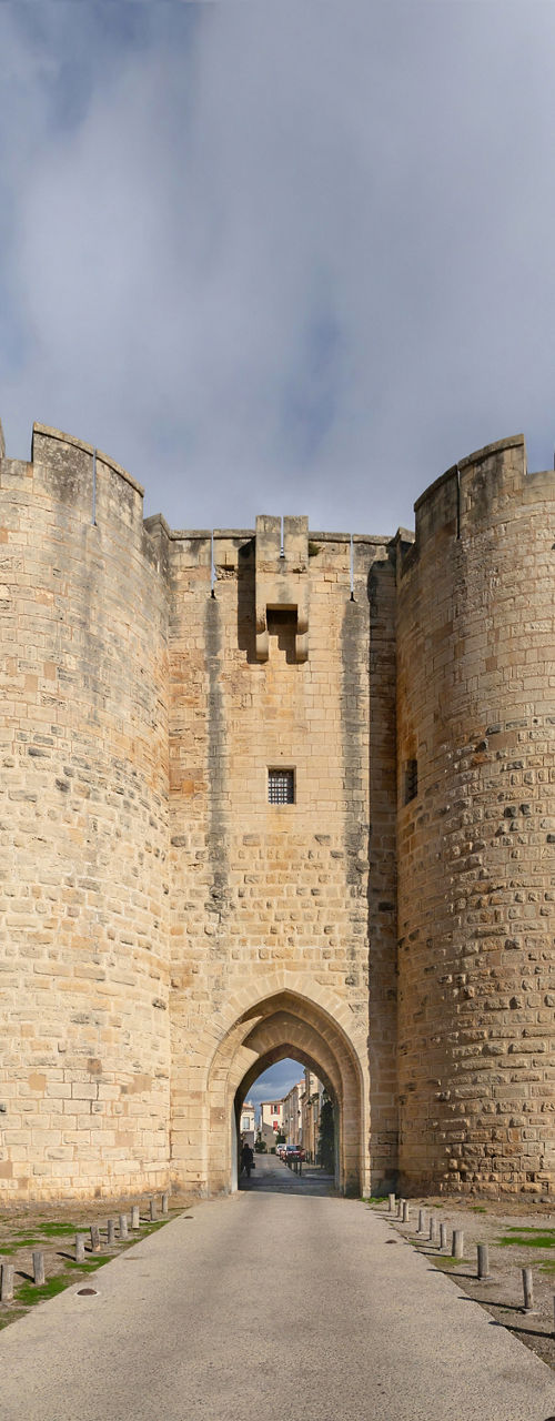 Historic stone fortress under cloudy sky