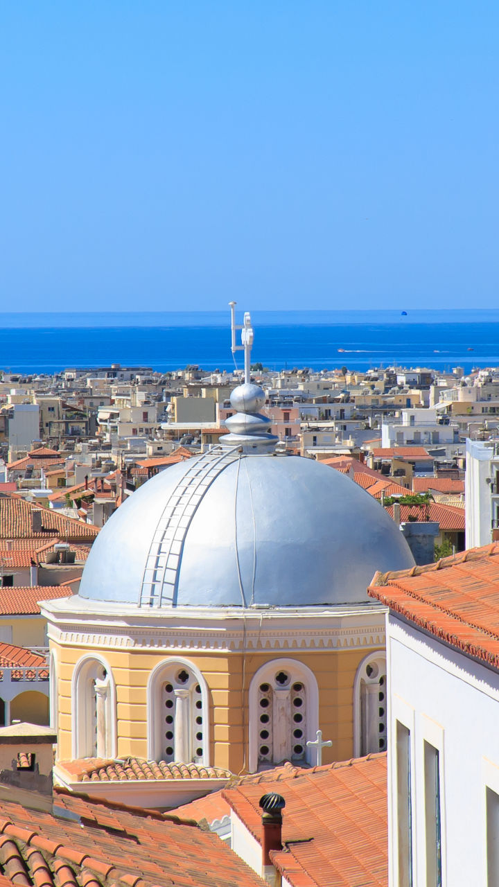 Mediterranean cityscape with domed church rooftops