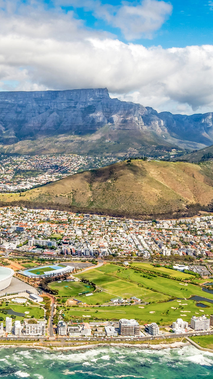 Aerial view of Cape Town coastline and Table Mountain