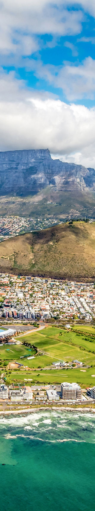 Aerial view of Cape Town coastline and Table Mountain