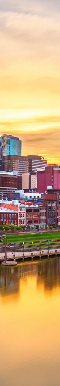 Nashville city skyline at sunset over river