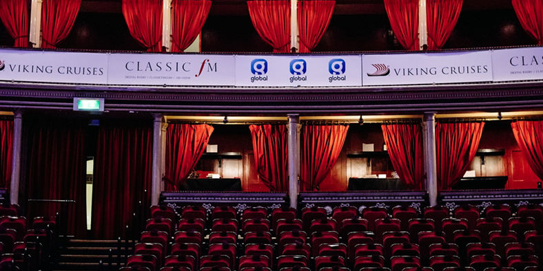 Elegant theater interior with red curtains