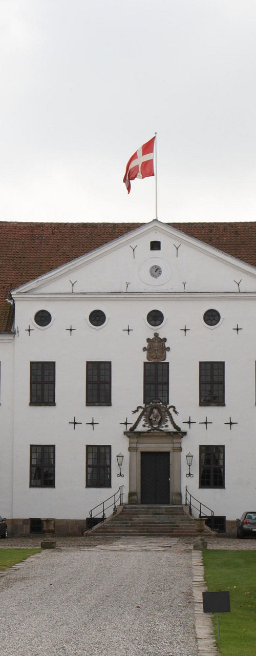 Historic Danish estate with flag display