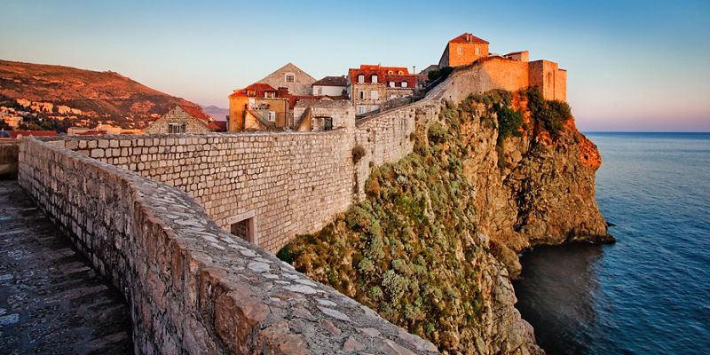 Historic stone fortress on coastal cliff