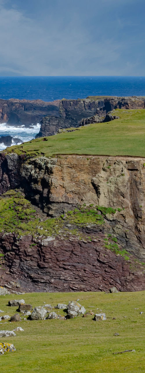 Dramatic coastal cliffs with ocean view