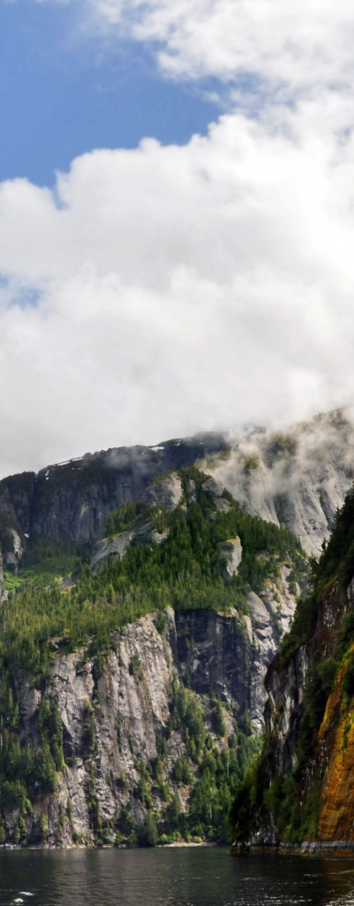 Scenic fjord with cliffs and calm waters