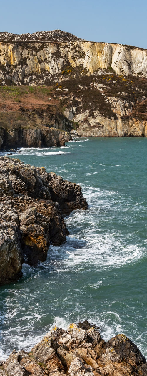 Scenic coastal cliffs with ocean waves