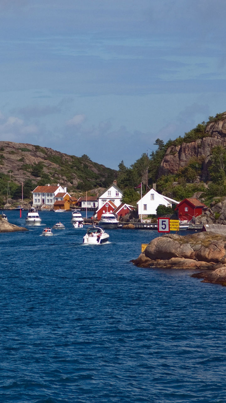 Scenic coastal village with rocky cliffs