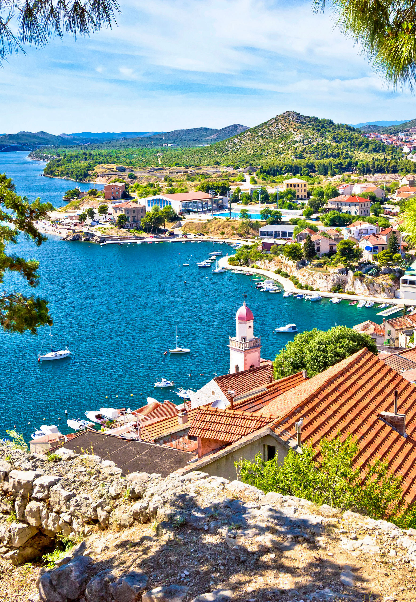 Scenic coastal town with red rooftops