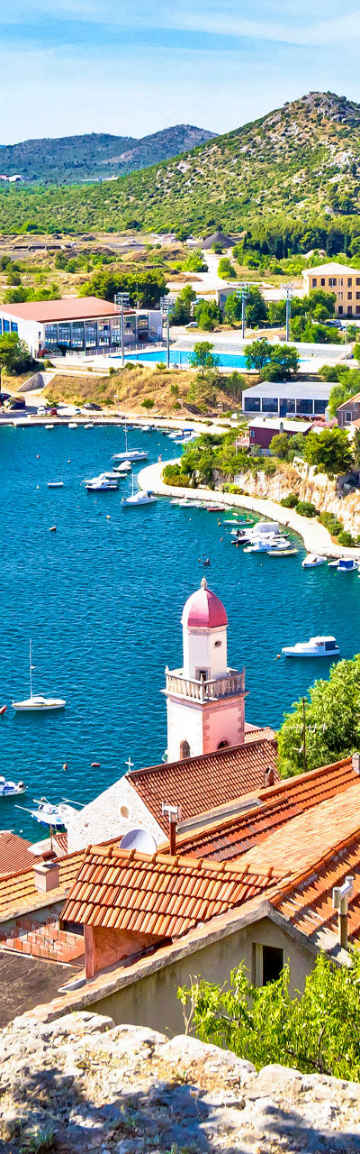Scenic coastal town with red rooftops