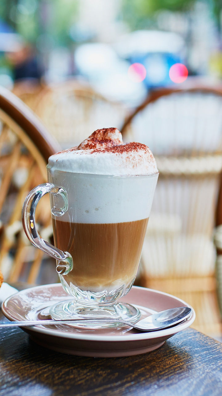 Coffee with croissant at outdoor café