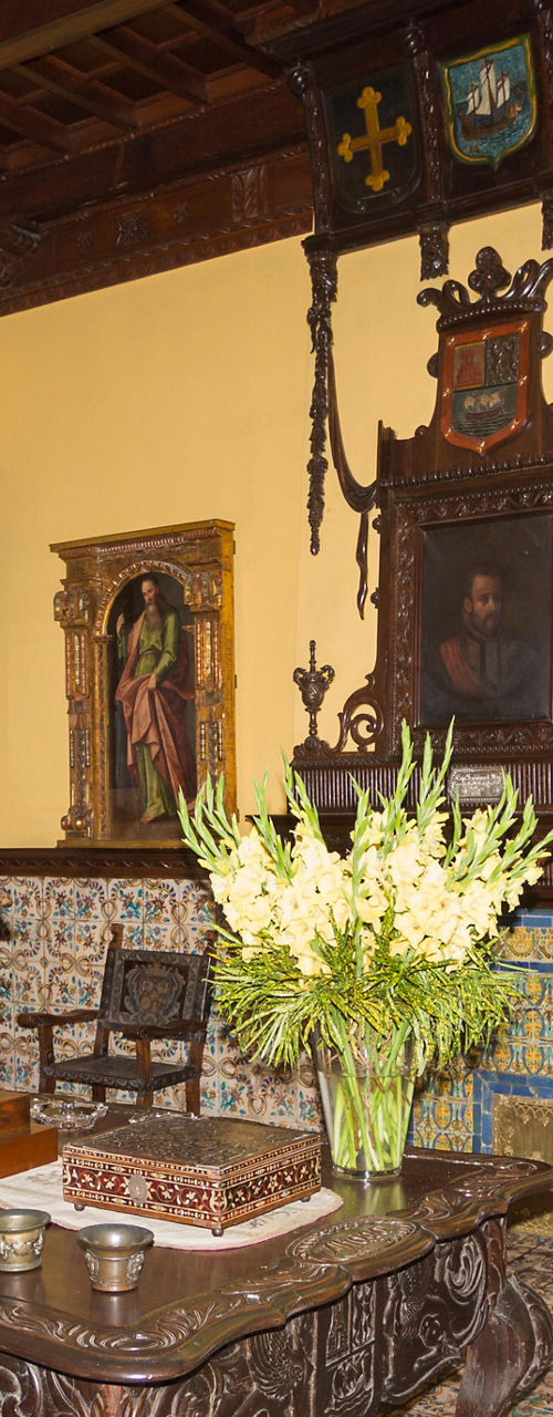 Historic room with ornate wooden furniture