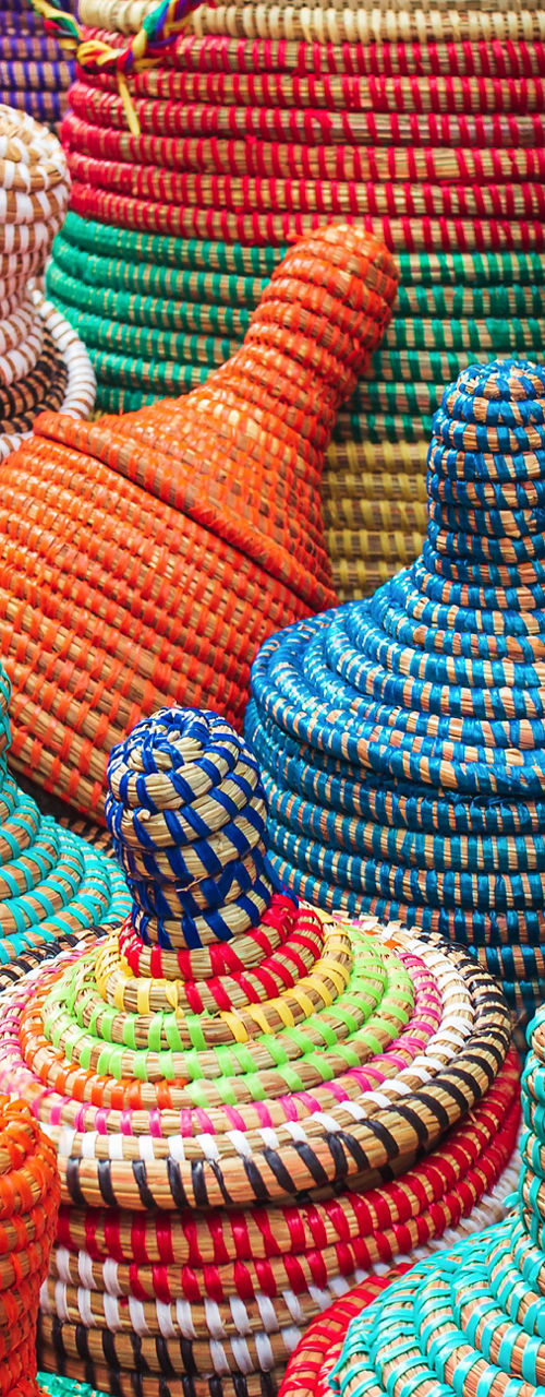 Colorful woven baskets in vibrant patterns