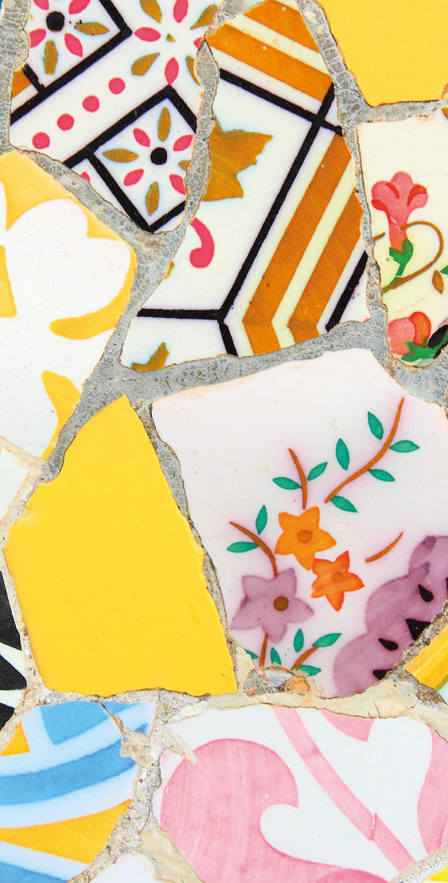 Colorful mosaic of broken ceramic tiles
