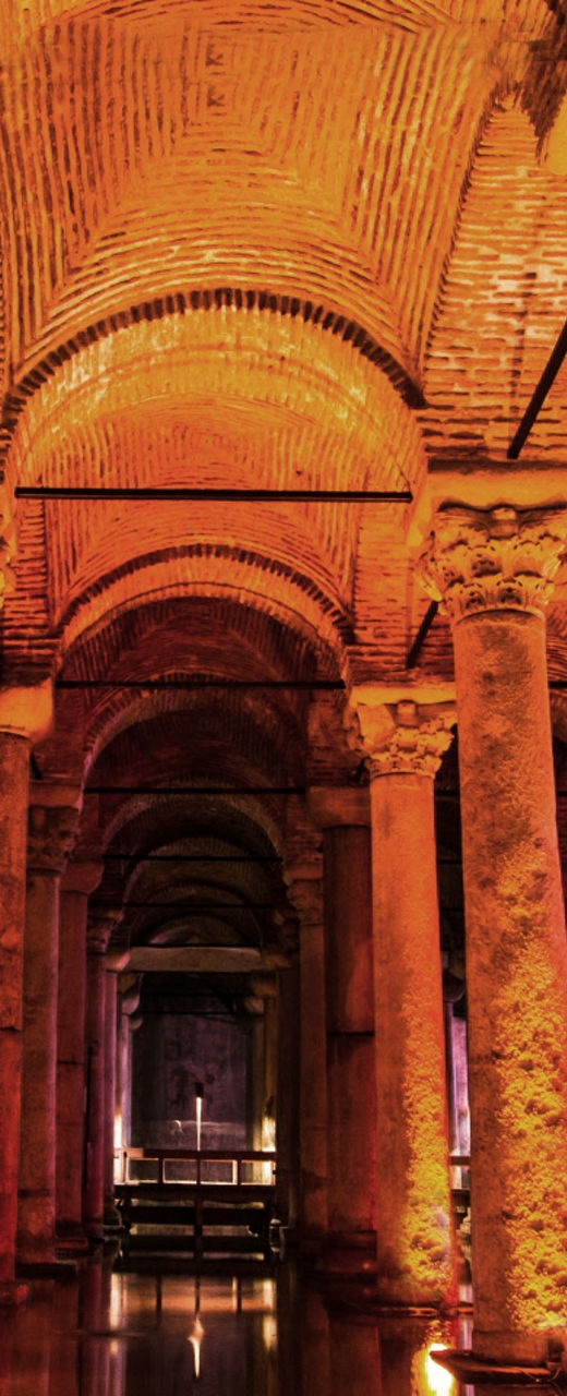 Ancient underground cistern with illuminated columns