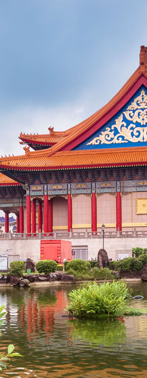 Traditional Chinese Building by Reflective Pond