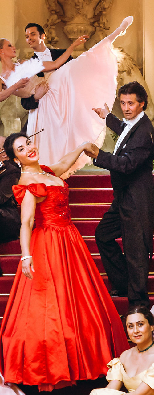 Orchestra in formal attire on staircase