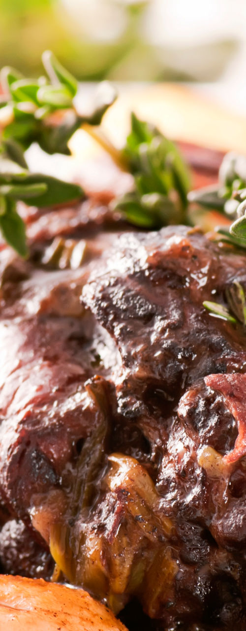 Braised beef with vegetables and herbs