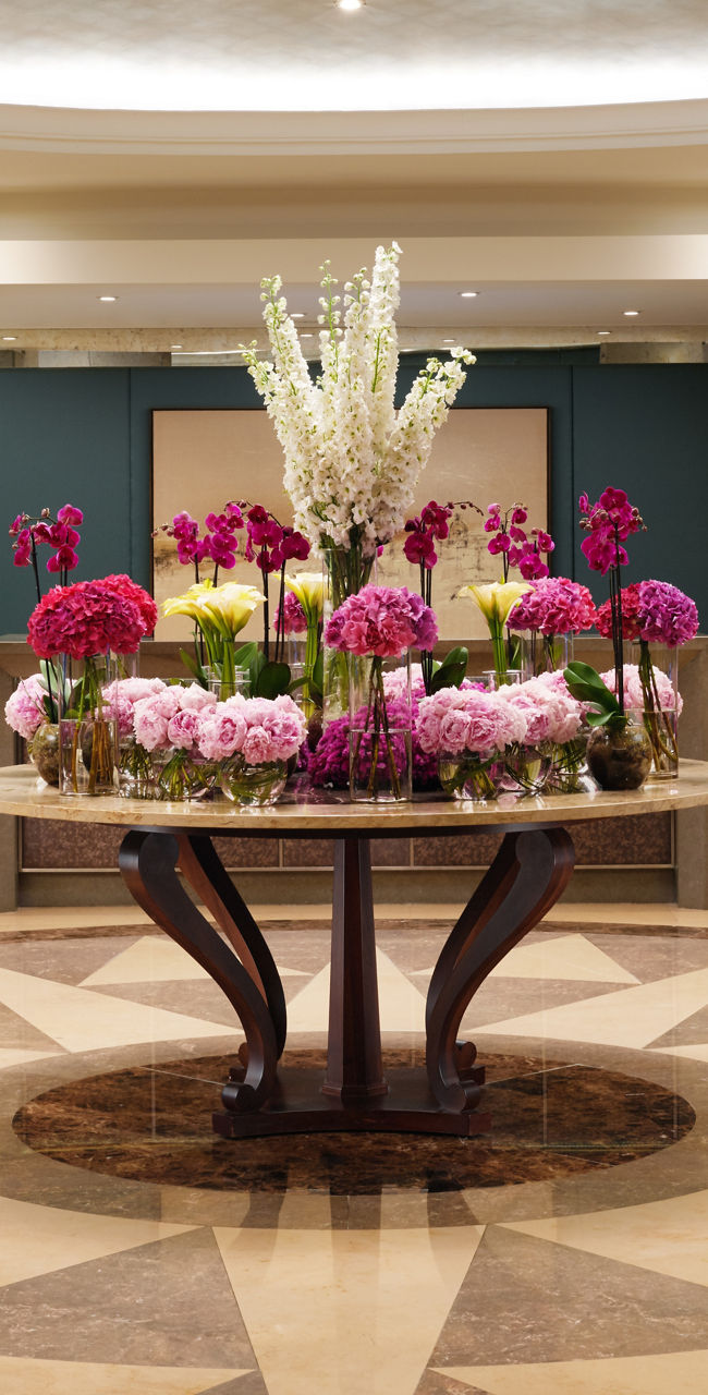 Elegant hotel lobby with floral centerpiece