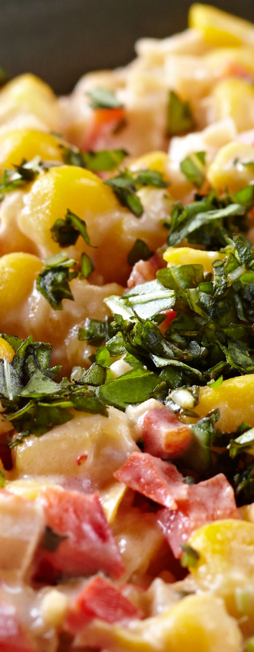 Creamy corn salad in ceramic bowls