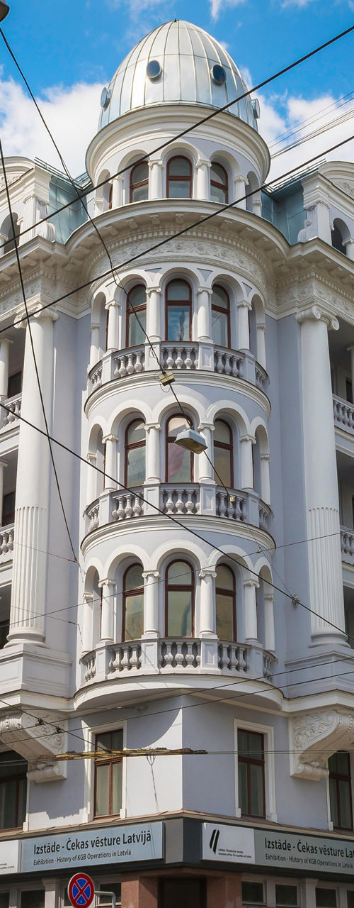 Historic white building on city street corner