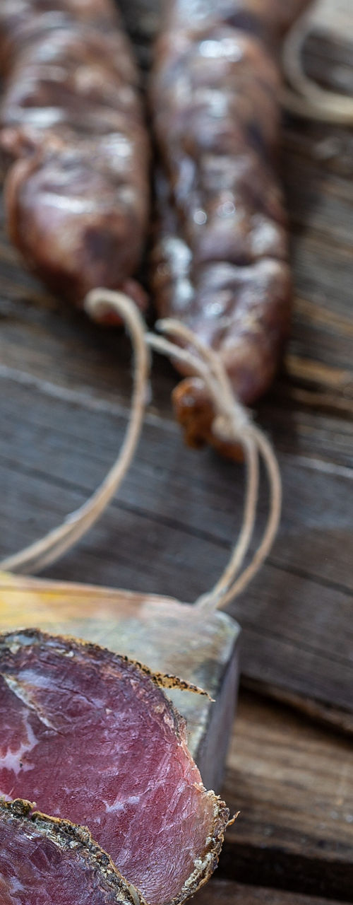 Rustic charcuterie with red wine and bread