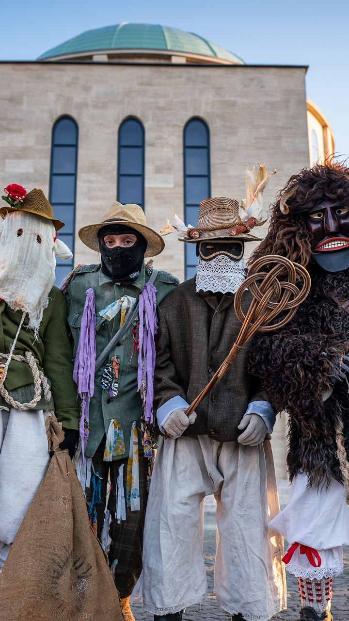 Traditional costumes in outdoor cultural gathering