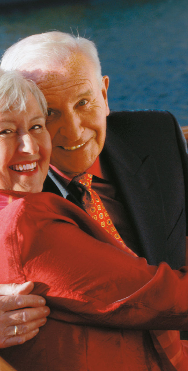 Couple enjoying wine on a boat