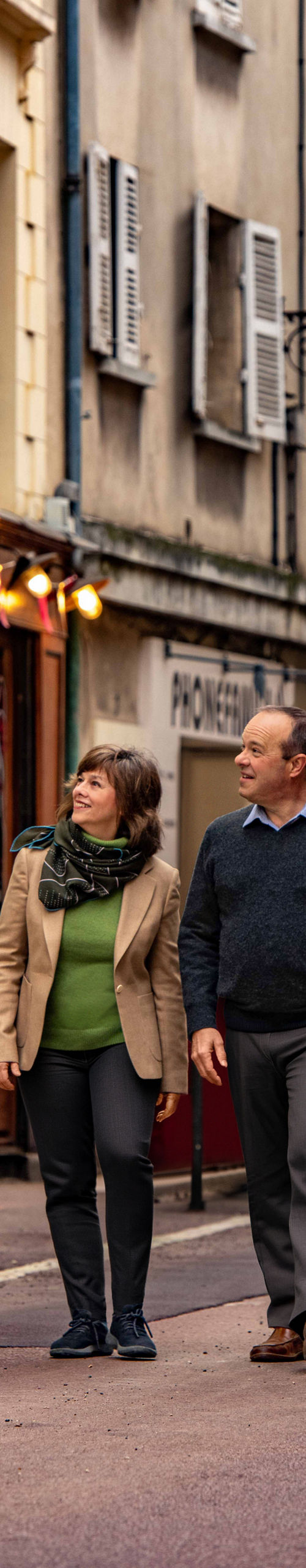 Couple strolling in European street