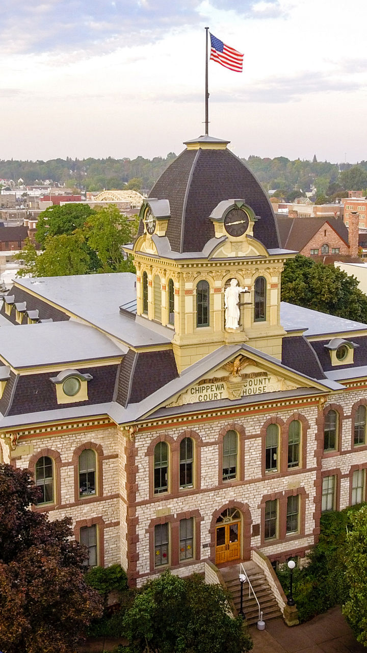 Historic courthouse with American flag