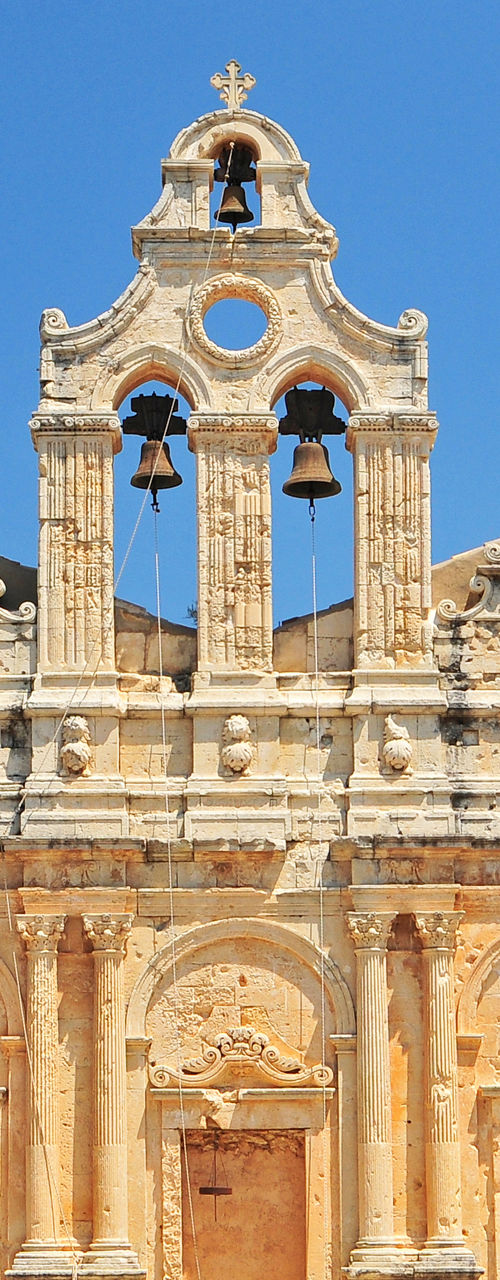 Historic stone monastery under clear sky