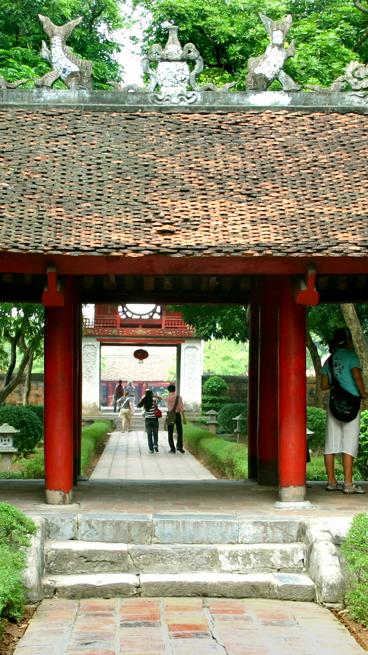 Ancient temple gate with lush greenery
