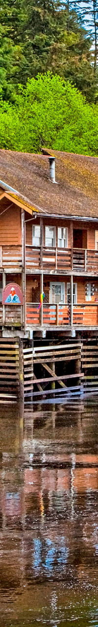 American flag on waterfront wooden buildings