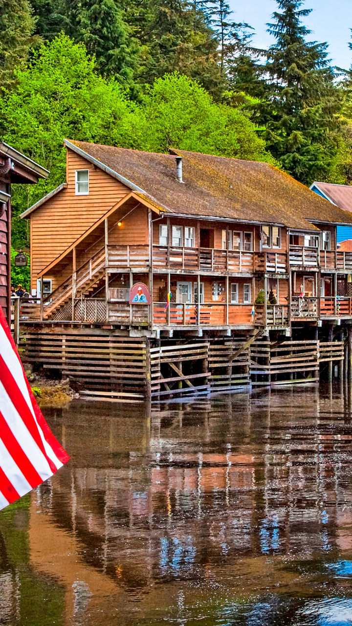 American flag on waterfront wooden buildings