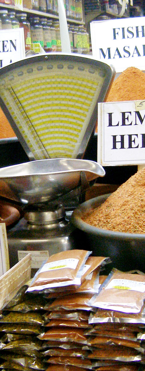 Variety of spices displayed in market stall