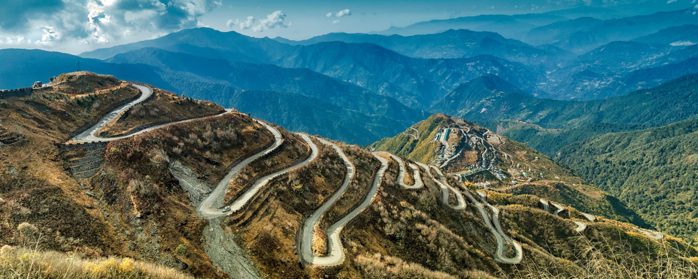 Winding mountain road with scenic views